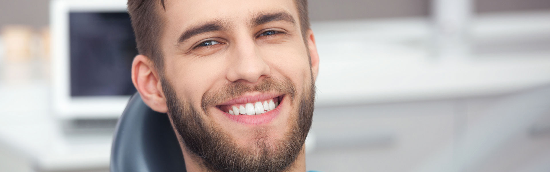 A man getting ready for dental implants treatment