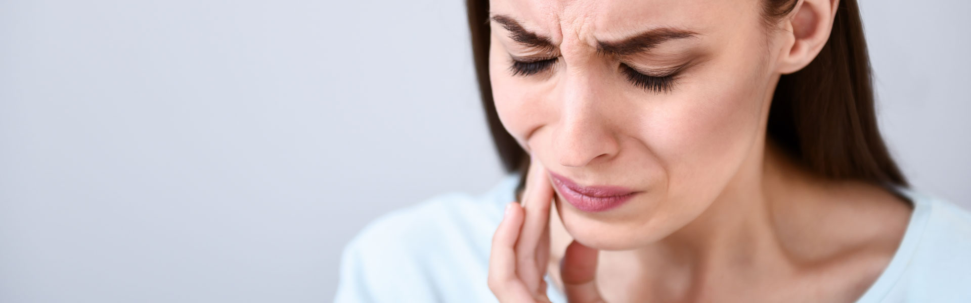 Woman suffering from toothache